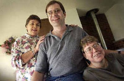 
Bernie Woller, center, was diagnosed with Asperger's syndrome, which is mild autism. He gets by these days with help from his mother, Dottie Papuzynski, left, and girlfriend Nancy Craft, right. 
 (Jesse Tinsley / The Spokesman-Review)