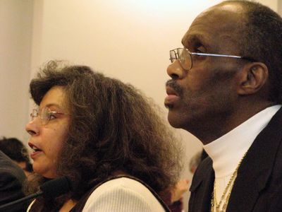 LiAnne Watley, left, speaks at a House hearing Wednesday in Olympia. Her husband, Fred Watley, was nearly denied a critical liver transplant due to a loophole in the law.  (RICHARD ROESLER / The Spokesman-Review)