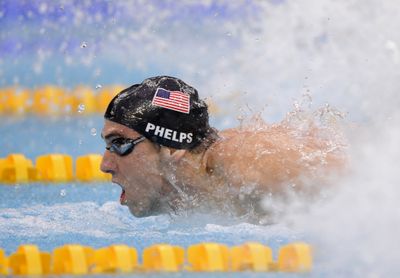 American Michael Phelps broke seven world records on his way to eight gold medals in the 2008 Beijing Olympics.  (Associated Press / The Spokesman-Review)