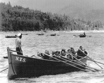 Farragut sailors row across Lake Pend Oreille during World War II. The naval training station that sat on the end of the lake during the war graduated almost 300,000 sailors. 