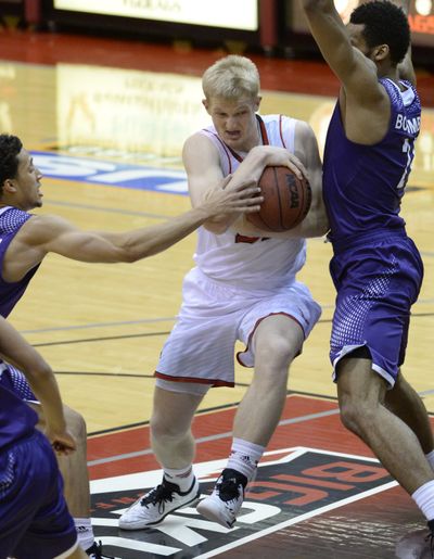 EWU reserve Bogdan Bliznyuk, center, is averaging 13.5 points per game in Big Sky Conference play. (Jesse Tinsley)