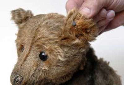
A tag inside the left ear identifies this bear owned by Becky Kramarz as an original Steiff teddy bear.
 (The Spokesman-Review)