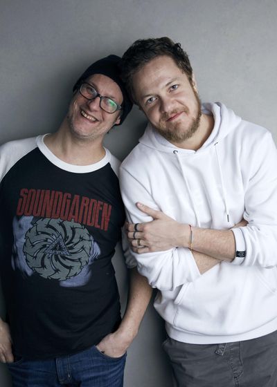 Director Don Argott, left, and Dan Reynolds pose for a portrait to promote the film “Believer” at the Music Lodge during the Sundance Film Festival on Sunday in Park City, Utah. (Taylor Jewell / Associated Press)