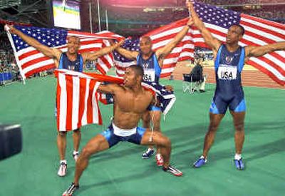 
The USOC used this performance by the 2000 gold medal-winning 400-meter relay team as an example of what NOT to do after winning an event. 
 (Associated Press / The Spokesman-Review)