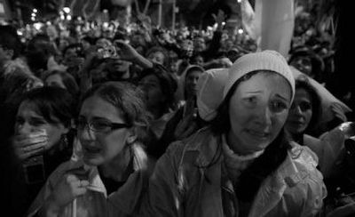 
Followers of Pope Benedict XVI react after he appeared at the Sao Bento Monastery in Sao Paulo, Brazil, on Wednesday. The pontiff is in Brazil on his first trip to Latin America.
 (Associated Press / The Spokesman-Review)