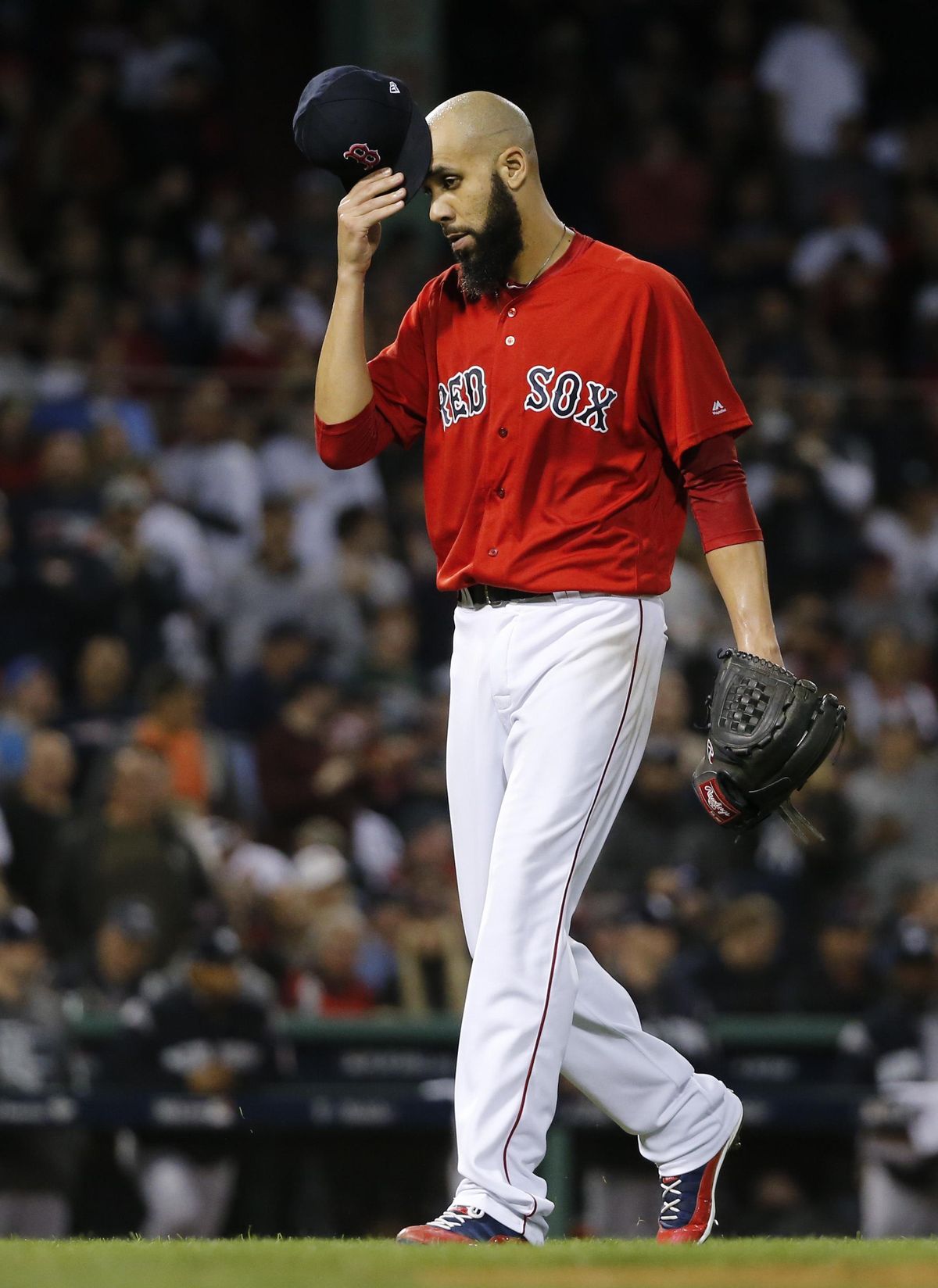 Boston Red Sox starting pitcher David Price is taken out during the second inning of Game 2  Saturday against the New York Yankees in Boston. (Elise Amendola / AP)