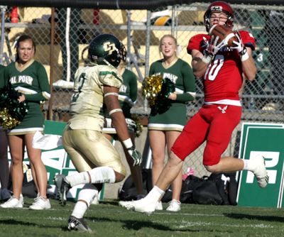 EWU’s Cooper Kupp hauls in a TD pass against Cal Poly on Saturday. (Associated Press)