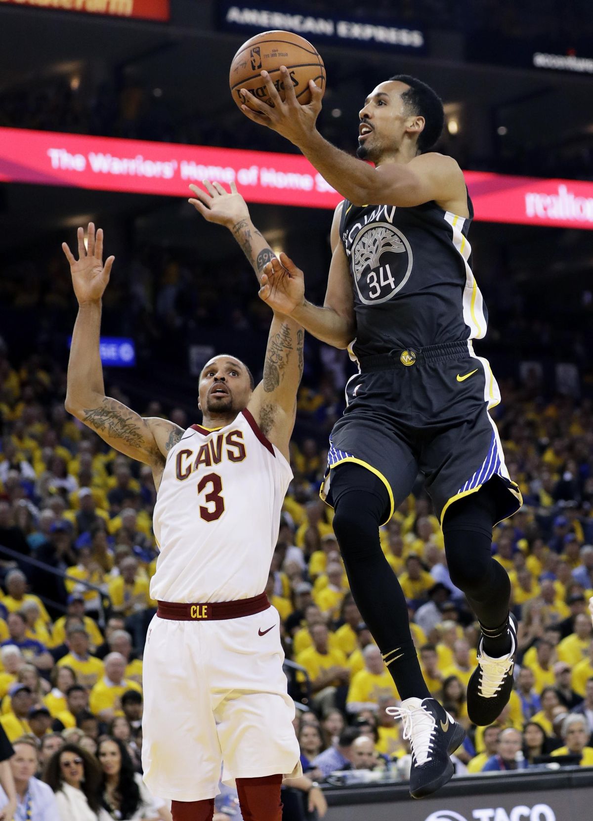 Golden State Warriors guard Shaun Livingston (34) shoots against Cleveland Cavaliers guard George Hill (3) during the first half of Game 2 of basketball’s NBA Finals in Oakland, Calif., Sunday, June 3, 2018. (Marcio Jose Sanchez / Associated Press)