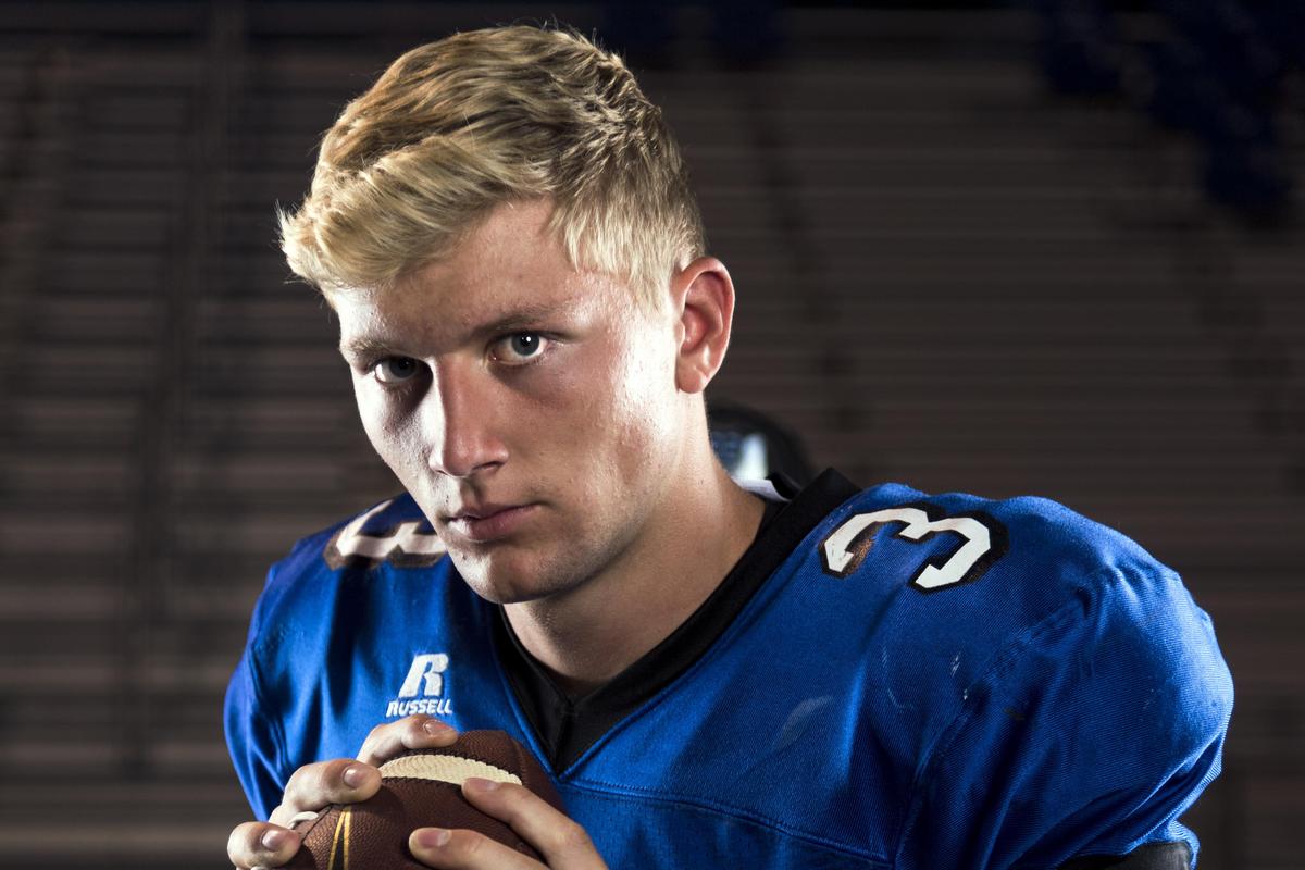 Coeur d’Alene High School quarterback Colson Yankoff poses for a portrait on the school’s field on Aug 22, 2017. (Colin Mulvany / The Spokesman-Review)
