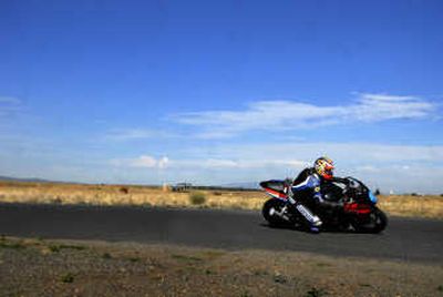 
Steven Cook, of Olympia,  takes a spin around Spokane Raceway Park on Thursday  as part of   Mike Sullivan's motorcycle racing school.  
 (Photos by Jed Conklin / The Spokesman-Review)