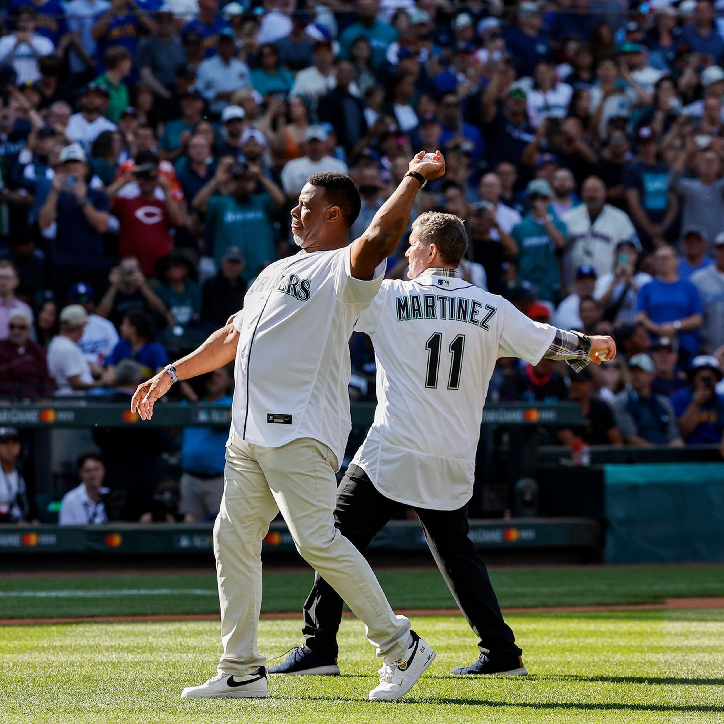 PHOTOS: Bobby Wagner Throws Out Ceremonial First Pitch At Mariners