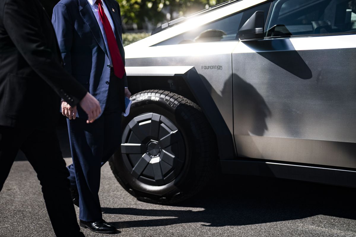 President Donald Trump and Tesla CEO Elon Musk peruse Tesla models on the South Lawn at the White House in March. Musk