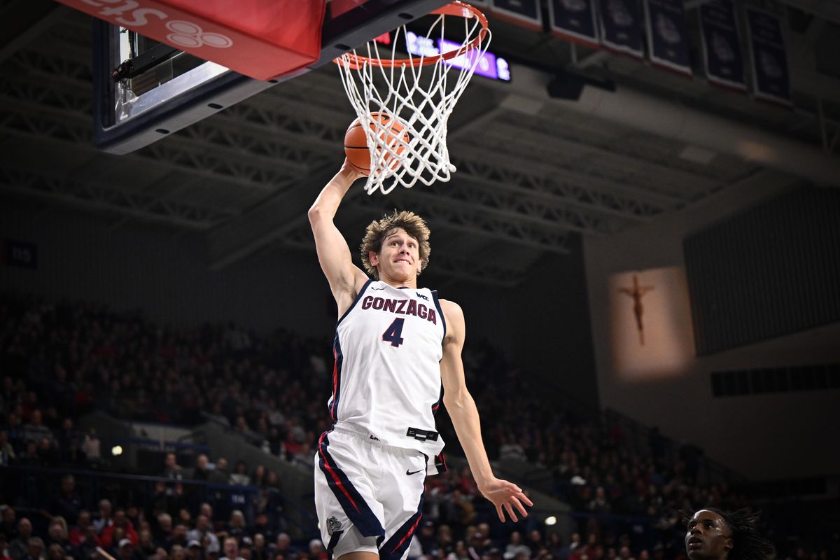 Gonzaga Bulldogs guard Davis Fogle (4) heads to the hoop for a dunk against the San Francisco Dons during the second half of a college basketball game on Saturday, Jan 24, 2026, at McCarthey Athletic Center in Spokane, Wash. Gonzaga won the game 68-66.  (Tyler Tjomsland / The Spokesman-Review)