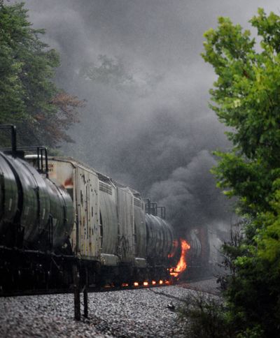 Smoke rises from a CSX train following the derailment of a train car Thursday, in Maryville, Tenn. The derailment caused the evacuation of thousands in the surrounding area. (Associated Press)
