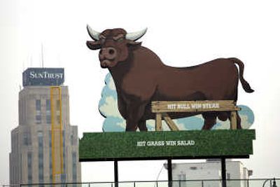 
The bull is shown atop the left outfield wall at Durham Bulls Athletic Park in Durham, N.C.Associated Press
 (Associated Press / The Spokesman-Review)