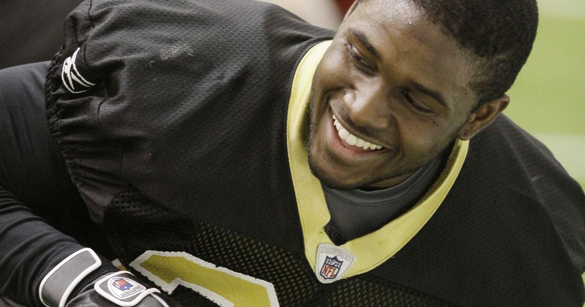 New Orleans Saints receiver Devery Henderson smiles after catching