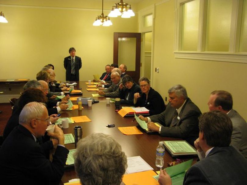 Members of the Joint Finance-Appropriations Committee gather for a 7 a.m. workshop meeting on Monday, before their 8 a.m. budget-setting session - at which the state parks budget is among the items on the agenda. Lawmakers urged parks supporters to buy a $35 annual state parks passport now to help support the park system in the current economic crunch. (Betsy Russell)