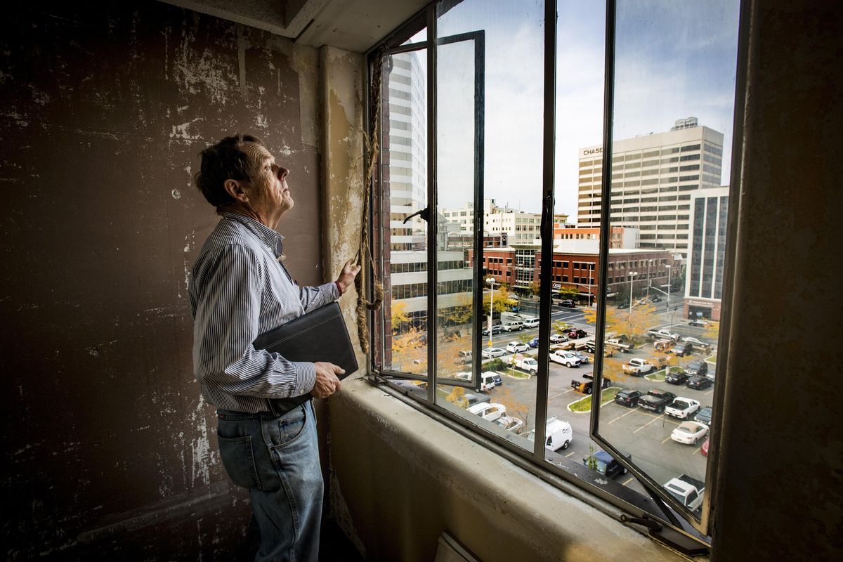 Ron Wendle, project architect for the Ridpath project checks out the view from one the hotel rooms being converted into an apartment. The renovation project is moving along, with the first units becoming available mid-December. Colin Mulvany/THE SPOKESMAN-REVIEW (Colin Mulvany / The Spokesman-Review)