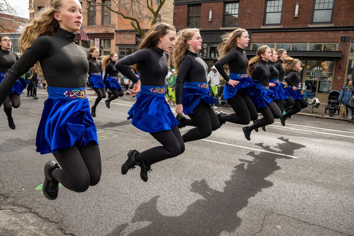 The Haran Dancers perform an Irish dance along the parade route Saturday during the 45th annual St. Patrick’s Day Parade downtown. (COLIN MULVANY)