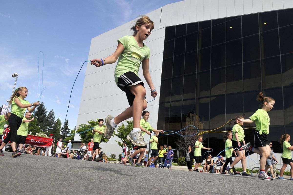 Members of the Hoppy Feet Jump Rope Club from Sunrise Elementary perform on Spokane Falls Boulevard. See more photos from Saturday’s Junior Lilac Parade at spokesman.com/picture-stories. (Jesse Tinsley)