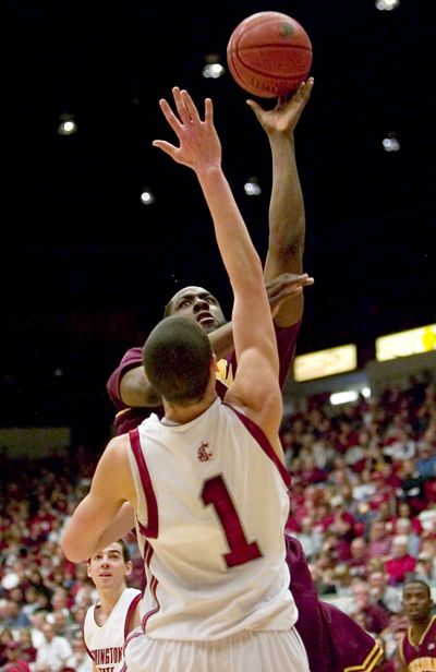Arizona State guard James Harden, top, shoots over WSU guard Klay Thompson. Washington State won 51-49 in overtime.  (Dean Hare / Associated Press)