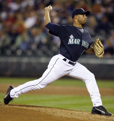Seattle Mariners starter Miguel Batista gave up five hits in six innings.  (Associated Press / The Spokesman-Review)