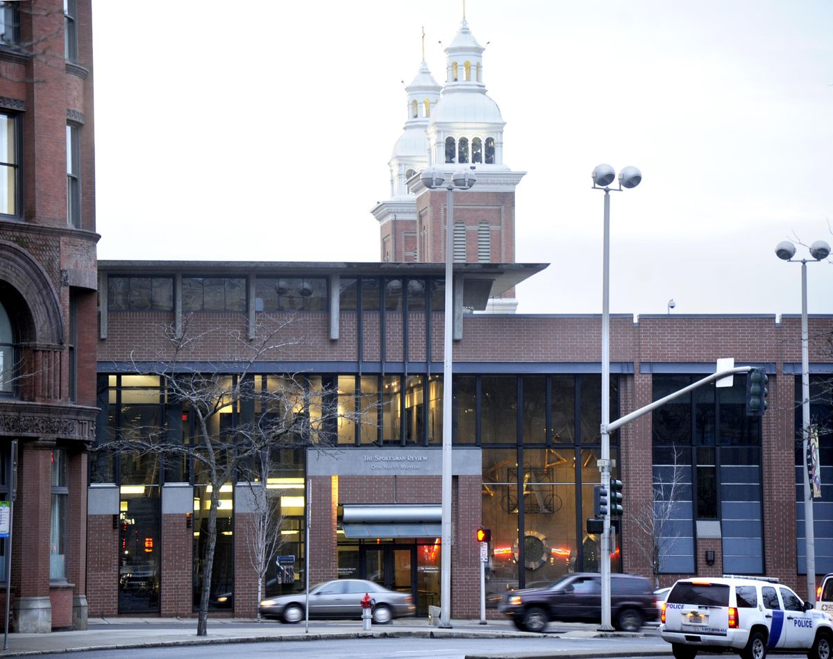 Present day: The Spokesman-Review production facility sits on the west side of Monroe Street south of Riverside Avenue. From 1902 to 1969, the block was dominated by the Touraine Hotel building, home to the offices of Spokane Gas and Fuel until the 1950s. The company that owns The Spokesman-Review bought the hotel in 1969 and the adjacent parcels, and built a printing plant there in 1980. The facility was rebuilt in 2003. (Jesse Tinsley / The Spokesman-Review)