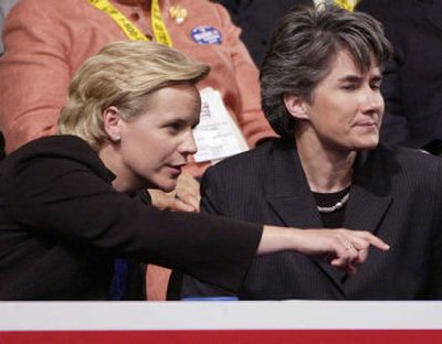 
Mary Cheney, left, daughter of Vice President Dick Cheney, seen here with her partner, Heather Poe, during the Republican National Convention in New York in September 2004, is pregnant. 
 (Associated Press / The Spokesman-Review)