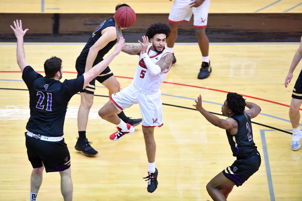 Eastern Washington Eagles guard Casson Rouse (5) passes the ball against College of Idaho during the first half of a college basketball game on Friday, December 11, 2020, at Reese Court in Cheney, Wash.  (Tyler Tjomsland/THE SPOKESMAN-RE)