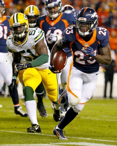 Denver Broncos running back Ronnie Hillman (23) breaks free for a touchdown run against the Green Bay Packers during the first half of an NFL football game, Sunday, Nov. 1, 2015, in Denver. (AP Photo/Jack Dempsey)  ORG XMIT: COMY121 (Jack Dempsey / AP)