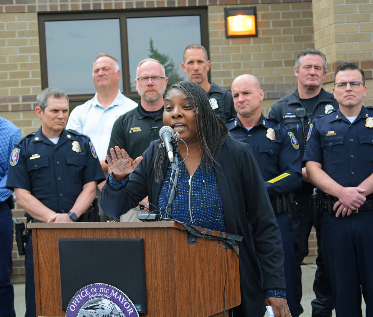 Freda Gandy, executive director of the Martin Luther King Jr. Community Center, speaks Tuesday during a press conference announcing a proposal for a new police precinct at the former East Side Library.  (Greg Mason / The Spokesman-Review)
