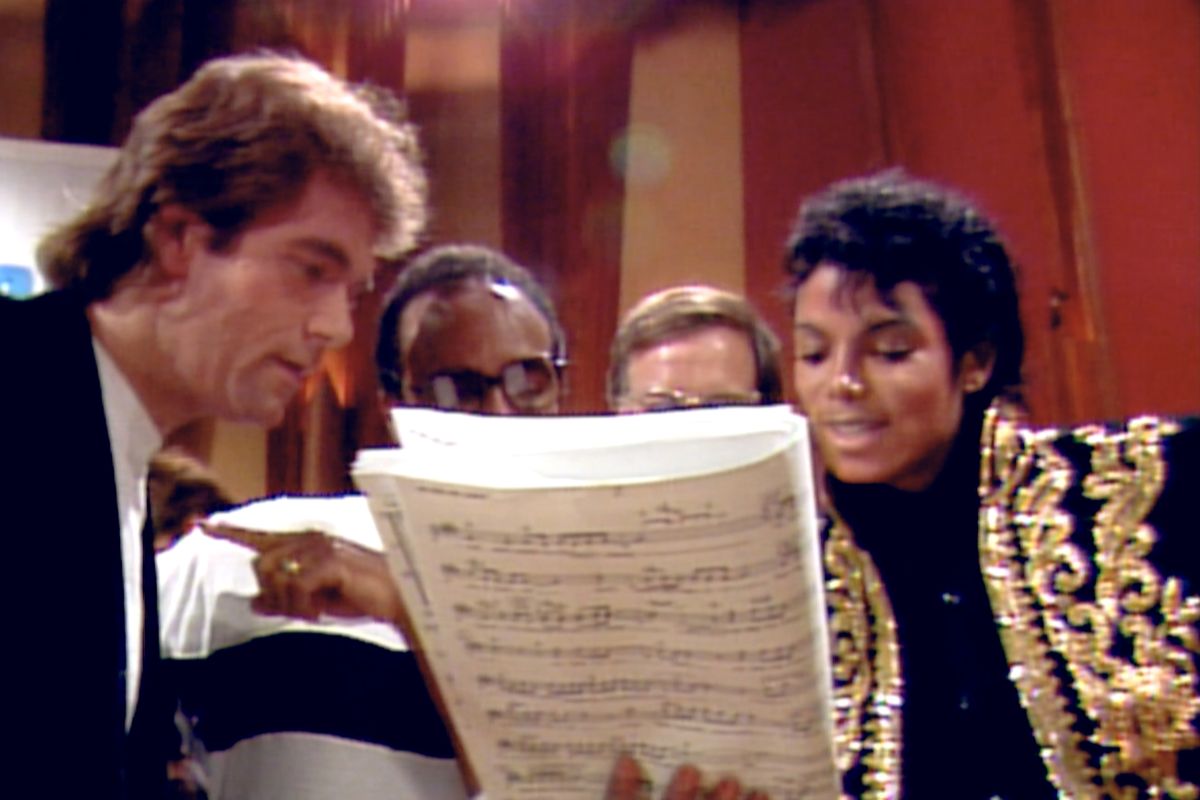 From left, Huey Lewis, Quincy Jones and Michael Jackson in "The Greatest Night in Pop," a documentary now on Netflix. (Netflix/TNS)  (Netflix/Netflix/TNS)