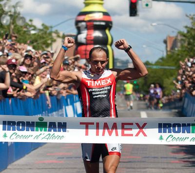 Viktor Zyemtsev approaches the finish line as he wins Ironman Coeur d'Alene Sunday afternoon with a final time of 8:32:29. BRUCE TWITCHELL/ Special to The Spokesman-Review (Larry Smith)