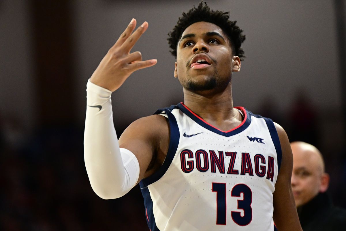 Gonzaga Bulldogs guard Malachi Smith (13) reacts after hitting a three against the Portland Pilots during the first half of a college basketball game on Saturday, Jan 2023, at McCarthey Athletic Center in Spokane, Wash.  (Tyler Tjomsland/The Spokesman-Review)