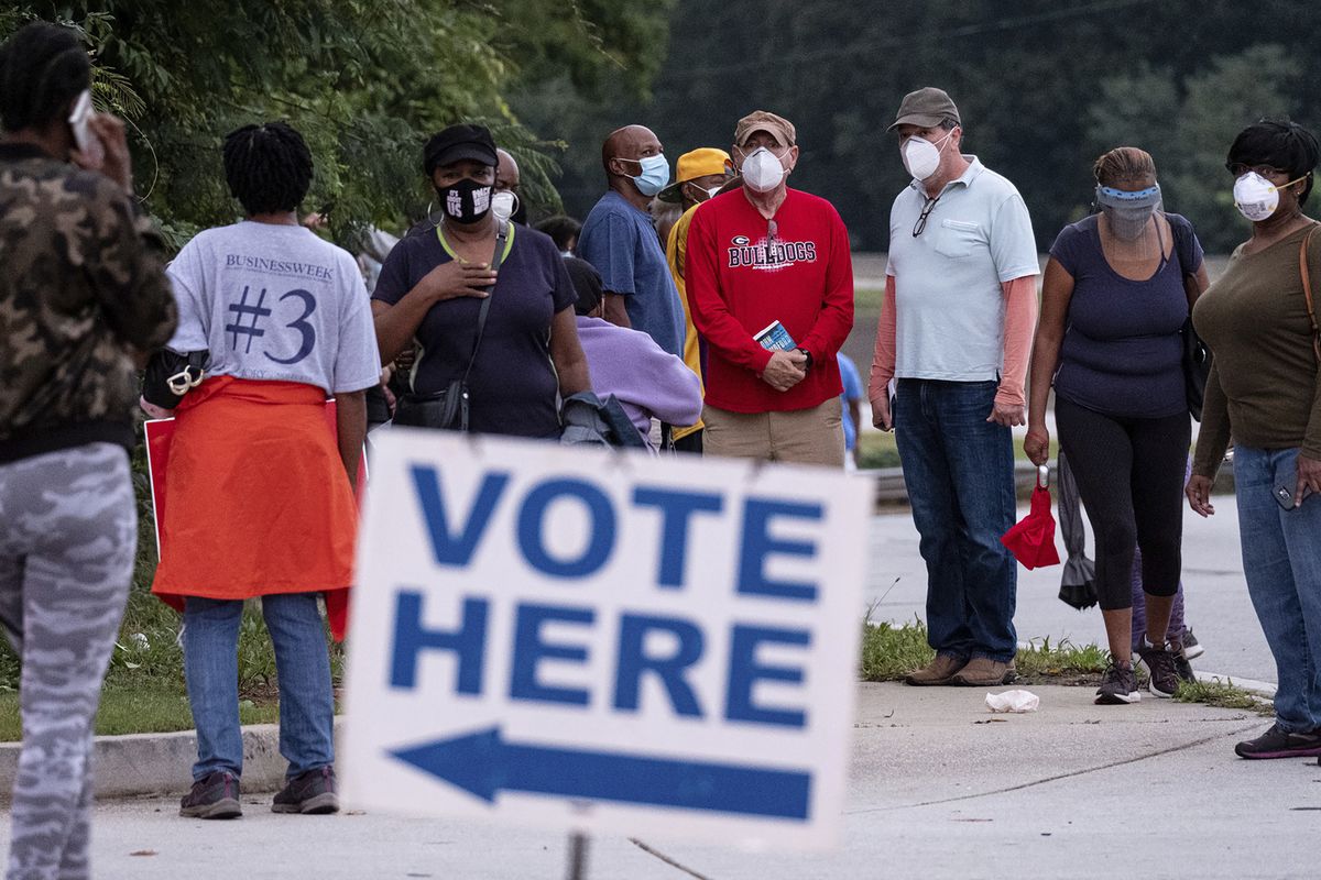 People wait in line to vote in Decatur, Ga., Monday, Oct. 12, 2020.  (Ben Gray)