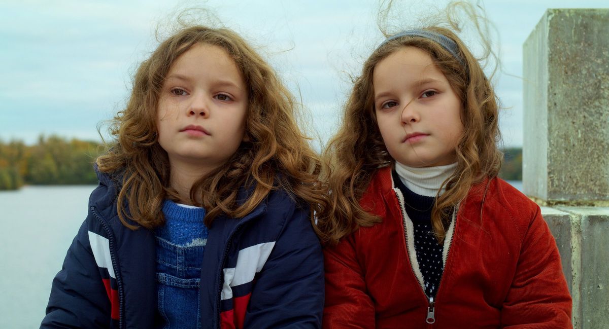 Real-life twin sisters Joséphine Sanz and Gabrielle Sanz star in “Petite Maman.”   (Lilies Films/Neon)