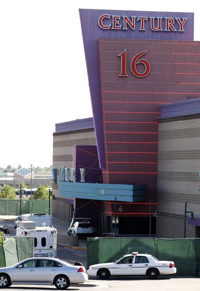 Police continue to monitor the area around the Century 16 theater in Aurora, Colo., on Saturday. (Associated Press)