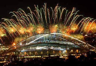 
Fireworks light the sky above Olympic Stadium during closing ceremony. 
 (Associated Press / The Spokesman-Review)