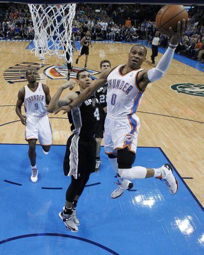 Thunder guard Russell Westbrook totaled 27 points, 7 rebounds and 7 assists in OKC’s 100-88 win over the San Antonio Spurs. (Associated Press)