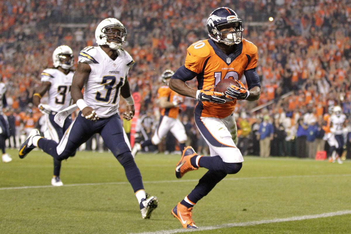 Broncos WR Emmanuel Sanders scores his second of three receiving TDs on the night, this one a 31-yard catch and run in the second quarter. (Associated Press)