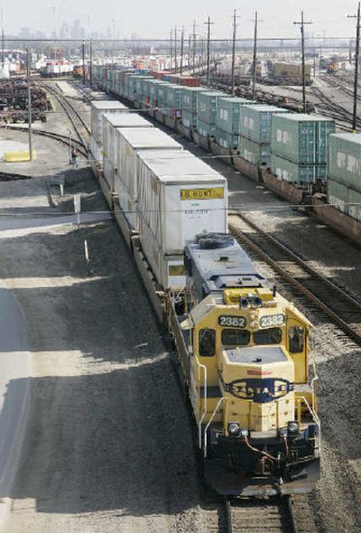 
A Burlington Northern Santa Fe locomotive works at the company's  yards in Kansas City, Kan. 
 (Associated Press / The Spokesman-Review)