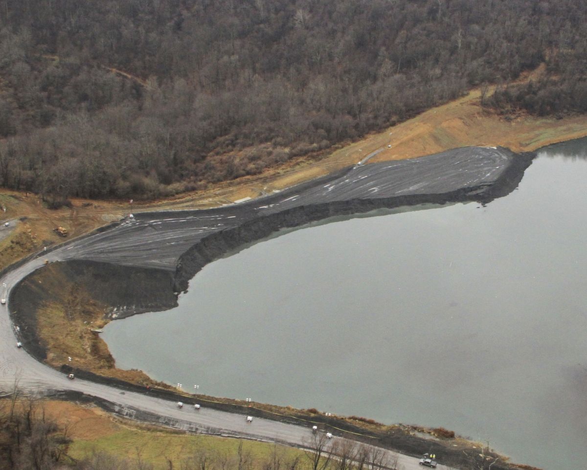 This Dec. 3, 2012 photo provided by the W.Va. Department of Environmental Protection shows the embankment after a collapse at the Consol