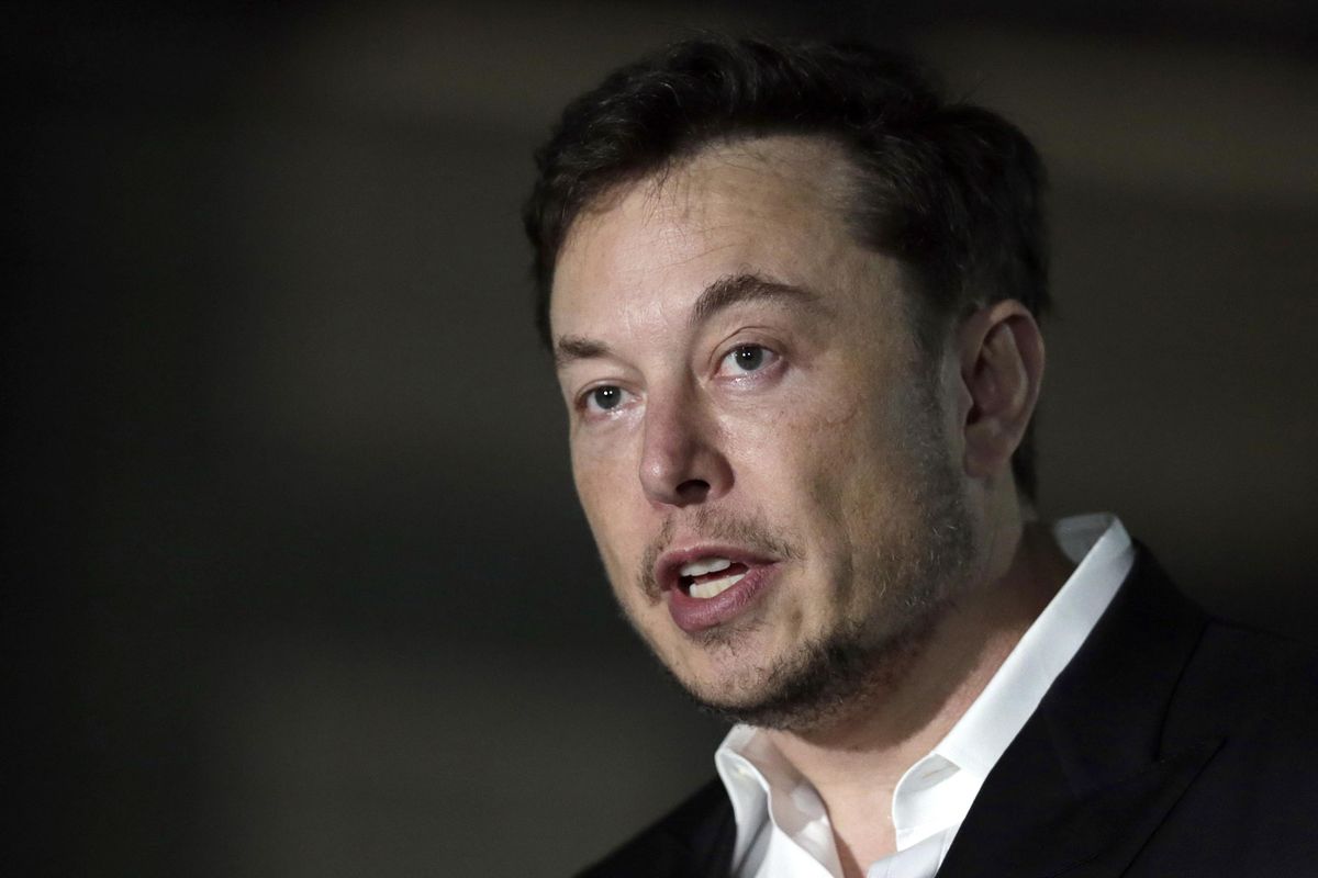 Tesla CEO and founder of the Boring Company Elon Musk speaks at a news conference, in Chicago on June 14. (Kiichiro Sato / Associated Press)