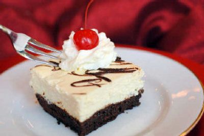 
Cap a romantic meal with this better-for-you brownie cheesecake. It has about 130 fewer calories and less than half the fat of the original recipe.
 (Photo courtesy of the Recipe Doctor / The Spokesman-Review)