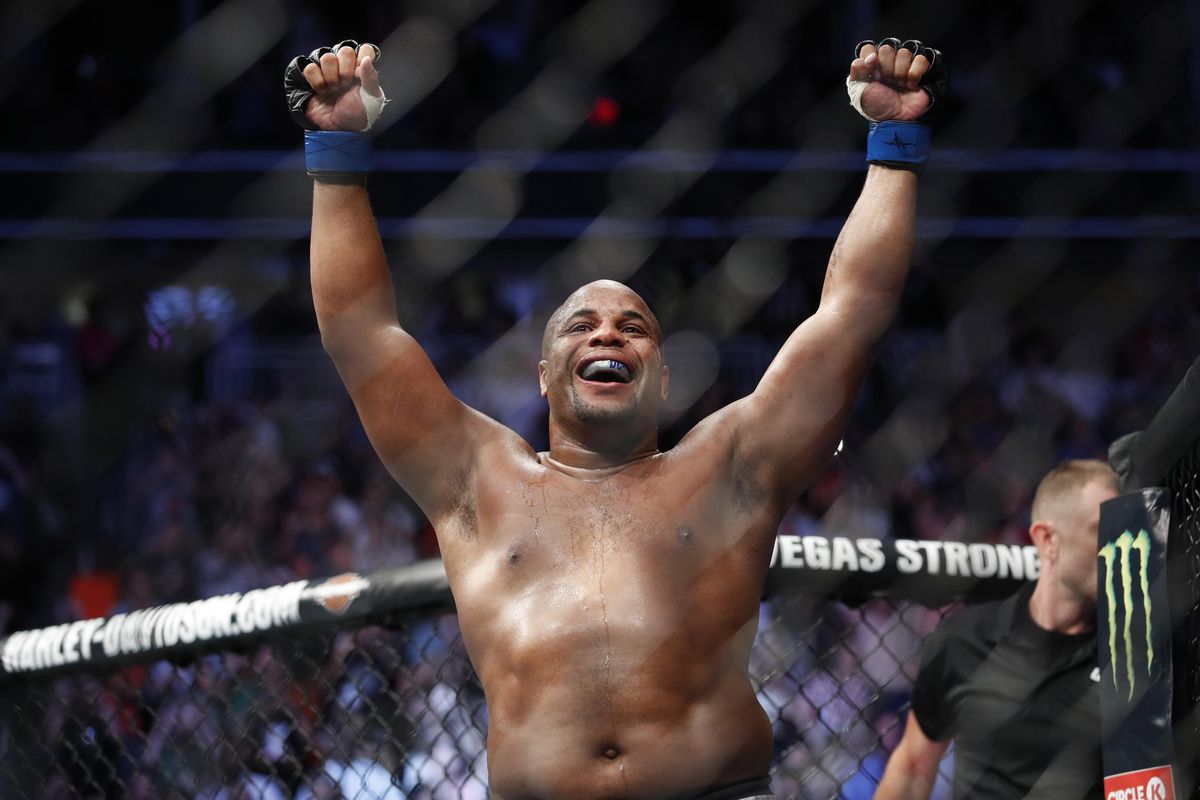 Daniel Cormier celebrates after defeating Stipe Miocic in a heavyweight title mixed martial arts bout at UFC 226, Saturday, July 7, 2018, in Las Vegas. (John Locher / Associated Press)