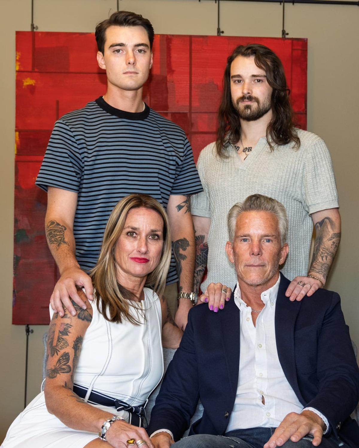 Former Oaks students Tristan and Aidan Wright are pictured with their parents, Jill and Joel Wright. Jill also worked at the school.  (Gen Heywood/FāVS News.)