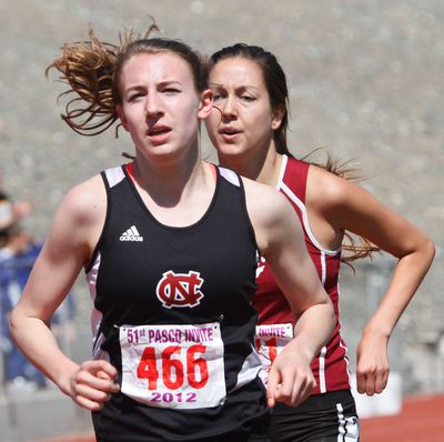 Katie Knight of North Central, left, has the nation’s third-best time in the 3,200 meters. (Associated Press)