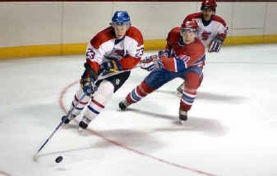 
Spokane Chiefs rookie Chris Bruton, left, gets past Adam Hobson during the team's scrimmage at the Arena Friday. Hobson was part of the Canadian U-18 team that won a world championship.
 (Christopher Anderson/ / The Spokesman-Review)
