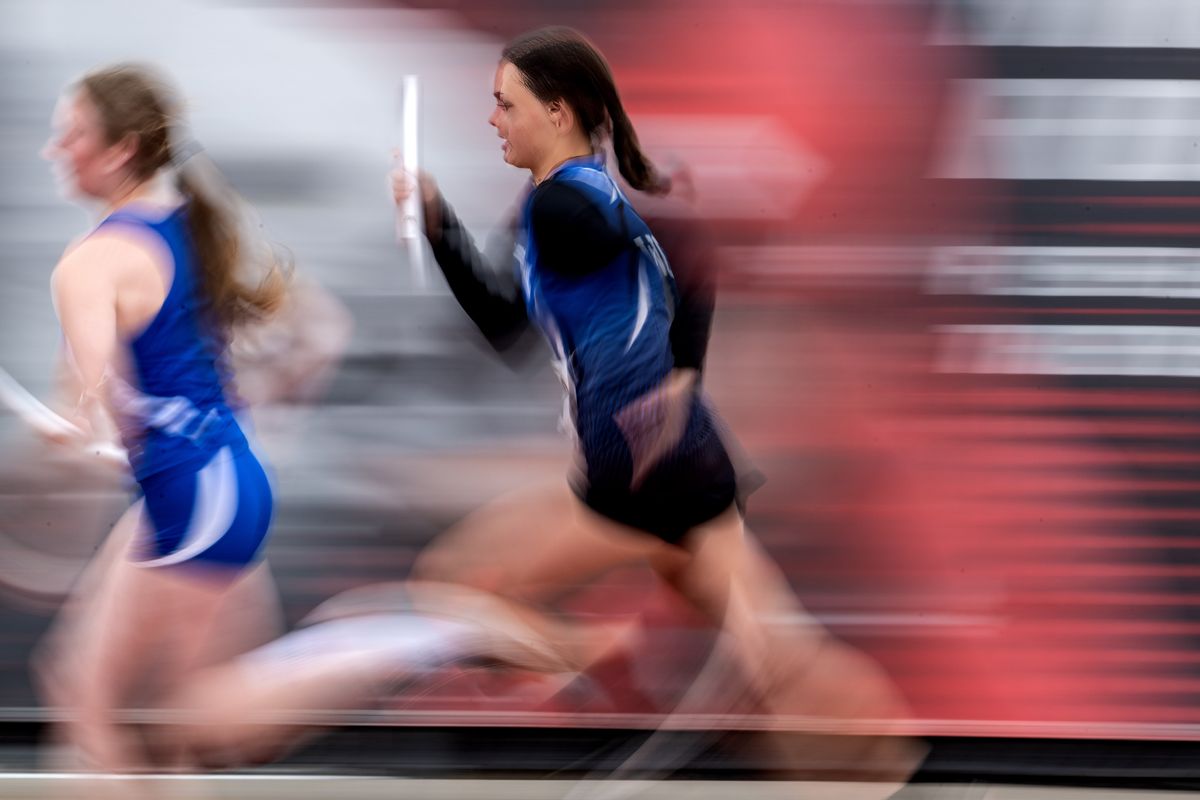 Wilbur Creston’s Kaidyn Maioho , on right, runs the third leg of the Girls 1B 4X100 Meter Relay during the WIAA State 1A, 1B and 2B Track and Field Championships, Saturday, May 28, 2022, at EWU’s Roos Field in Cheney. Wilbur Creston placed 2nd in the race.  (COLIN MULVANY/THE SPOKESMAN-REVIEW)