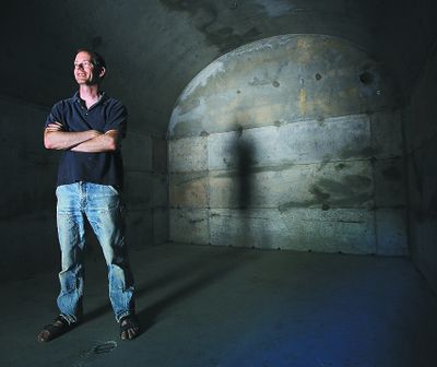 Kurt Timmermeister, shown in 2010, stands in his nearly completed 330-square-foot cheese cave on his Vashon Island, Wash., property.